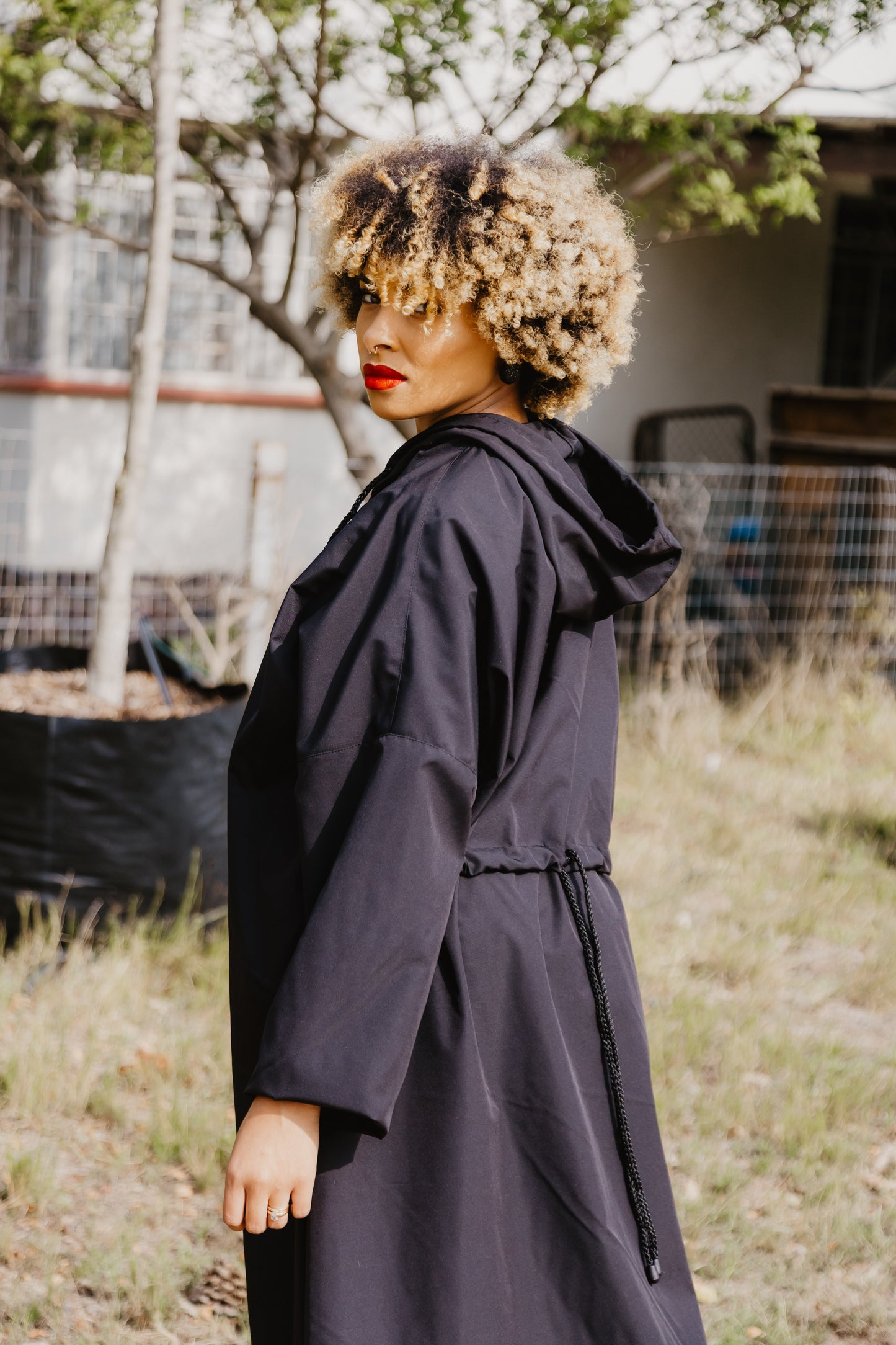 Black all weather hooded coat with back detail